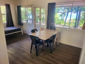 Square dining table inside a Bungalow