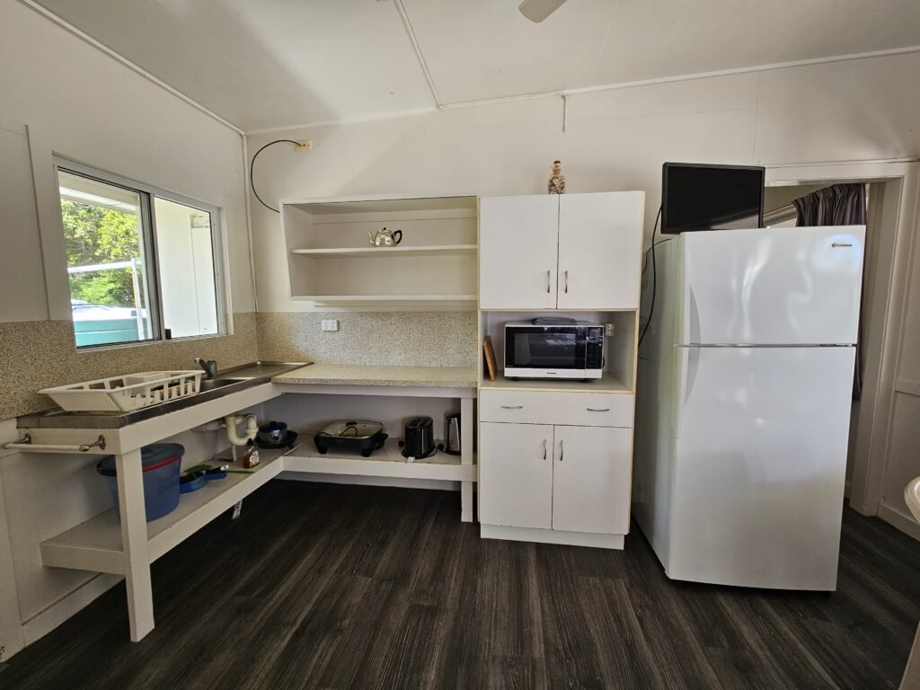 Kitchen inside a Bungalow at Sunset Beach 40 minutes from Airlie Beach