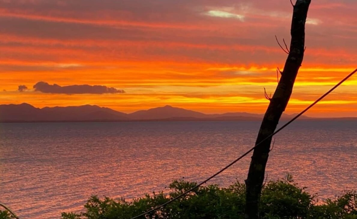 Orange sunset Over Sinclair Bay Orange sunset near Sinclair Bay, Whitsundays